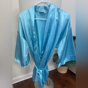 Women’s robe satin size medium NWOT Frederick’s of Hollywood